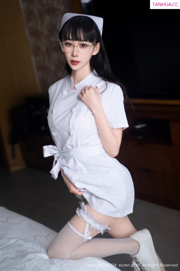   [XiuRen]高清写真图 2024.08.28 No.9077 宝宝甜 美腿丝袜第10张图片